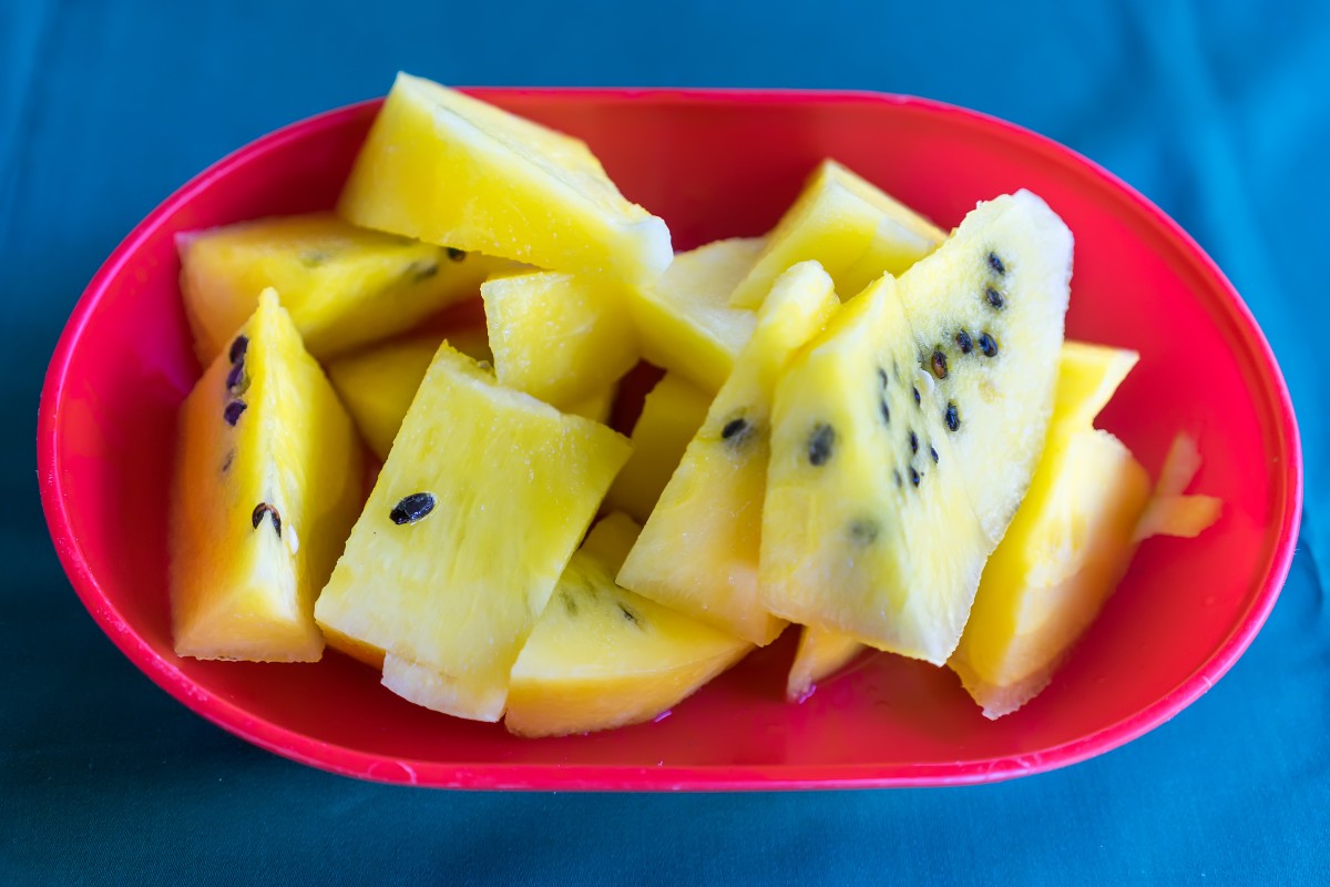 Yellow watermelon on table