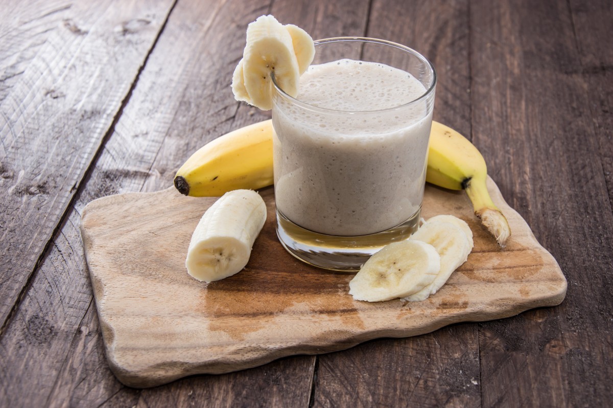 Banana juice on wooden cutting board in the restaurant